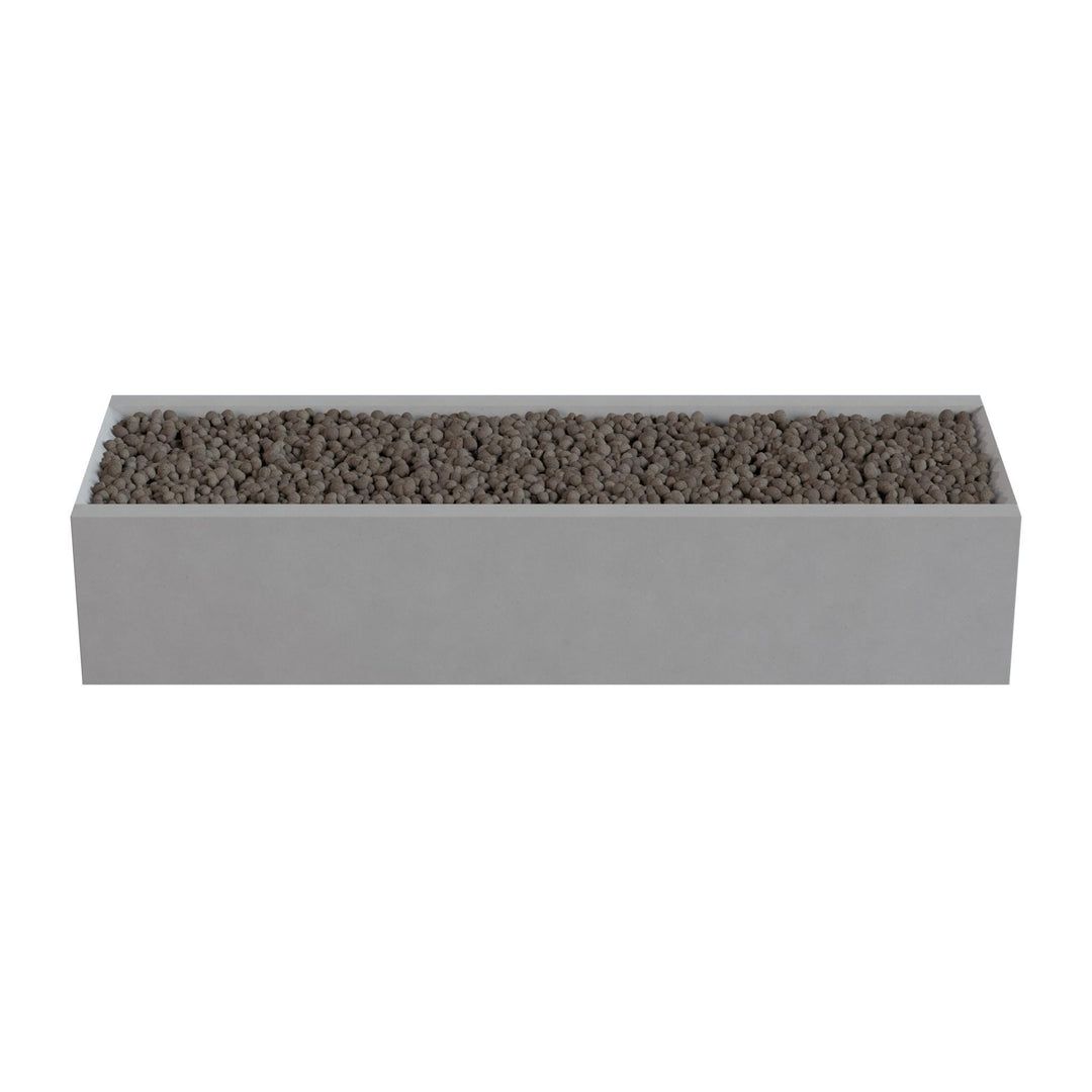 A rectangular gray planter box filled with small rocks or pebbles.