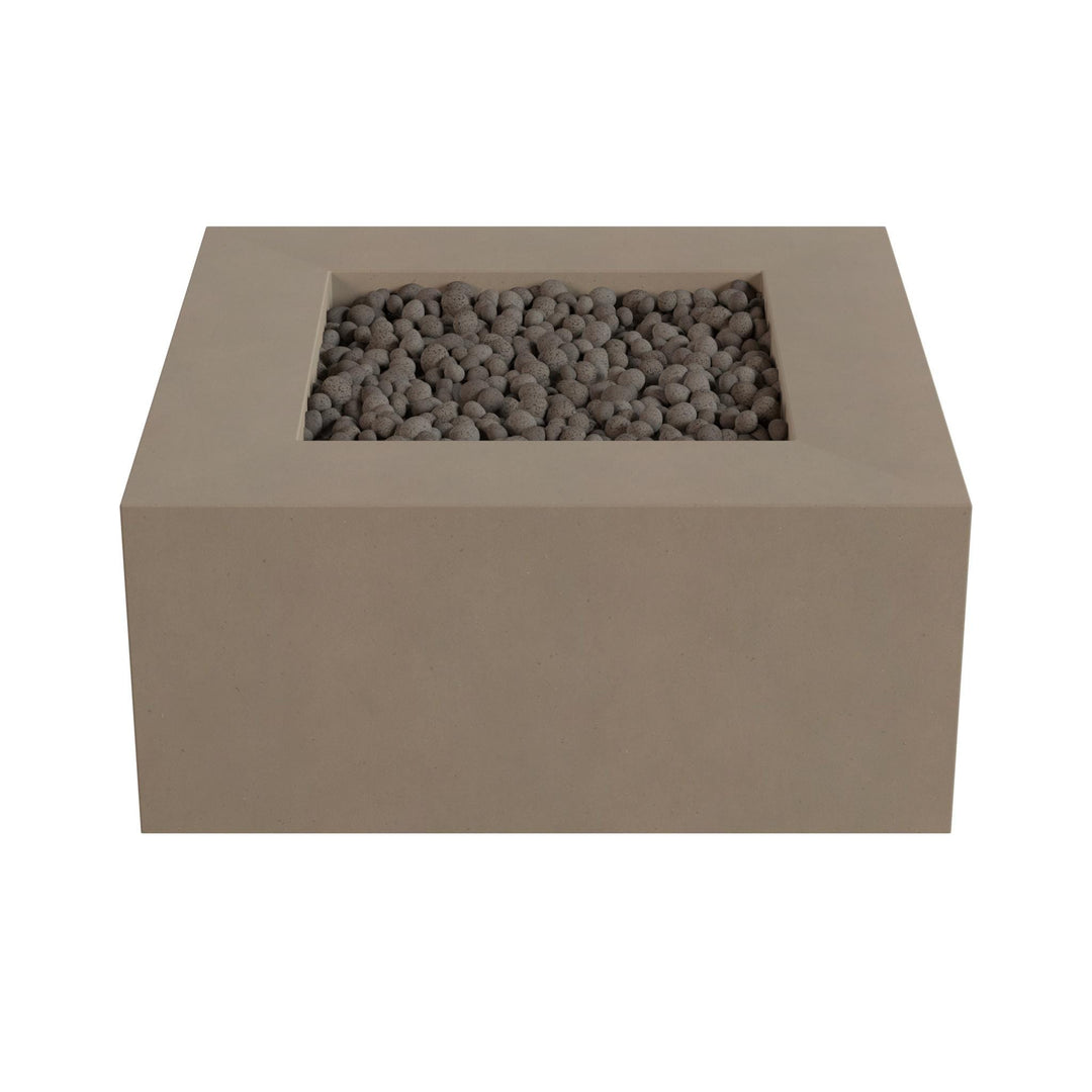 A rectangular concrete planter filled with small gray stones or pebbles.