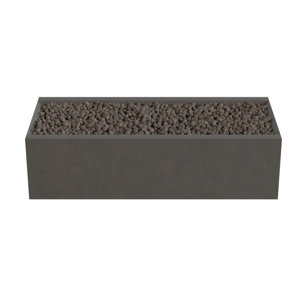 A rectangular gray planter box filled with small rocks or pebbles.