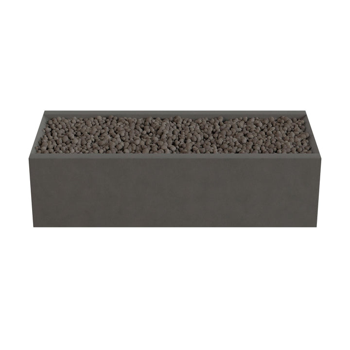 A rectangular gray planter box filled with small rocks or pebbles.