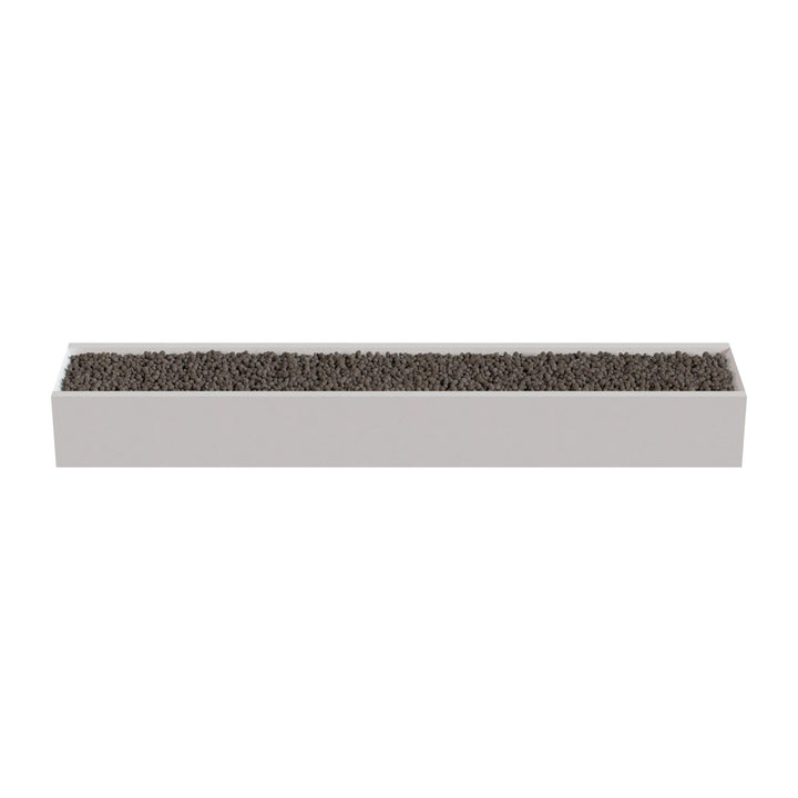 A rectangular planter box filled with small rocks or pebbles.