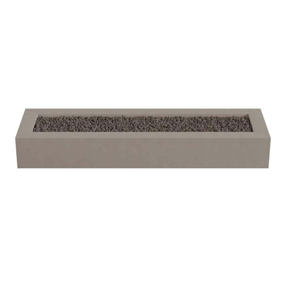 A rectangular concrete planter filled with small rocks or pebbles.