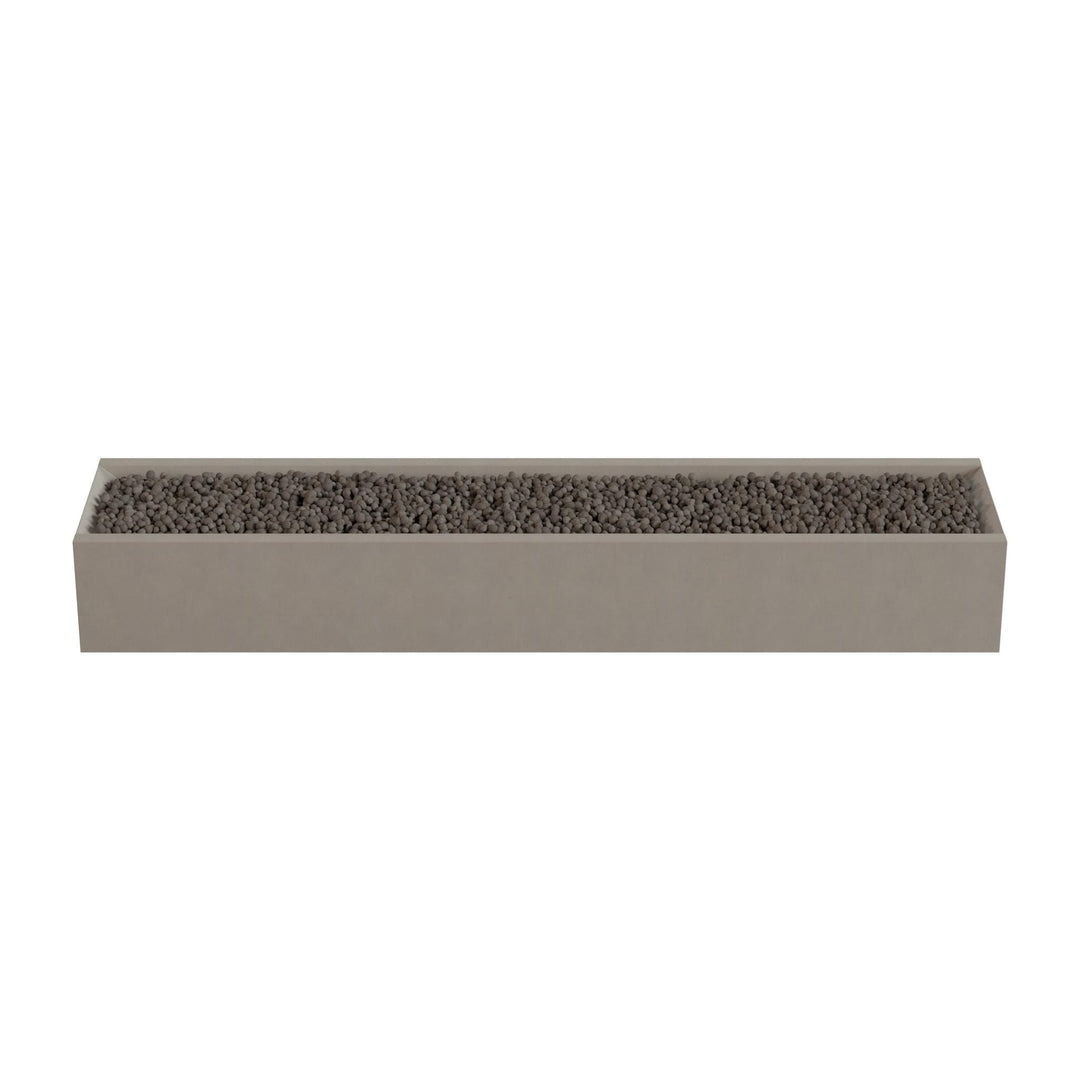 A rectangular planter box filled with small rocks or pebbles.