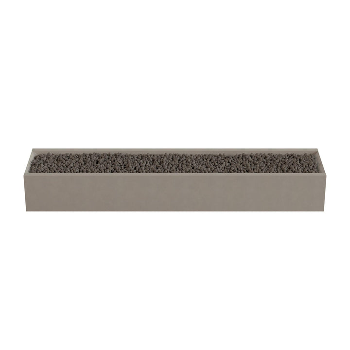 A rectangular planter box filled with small rocks or pebbles.