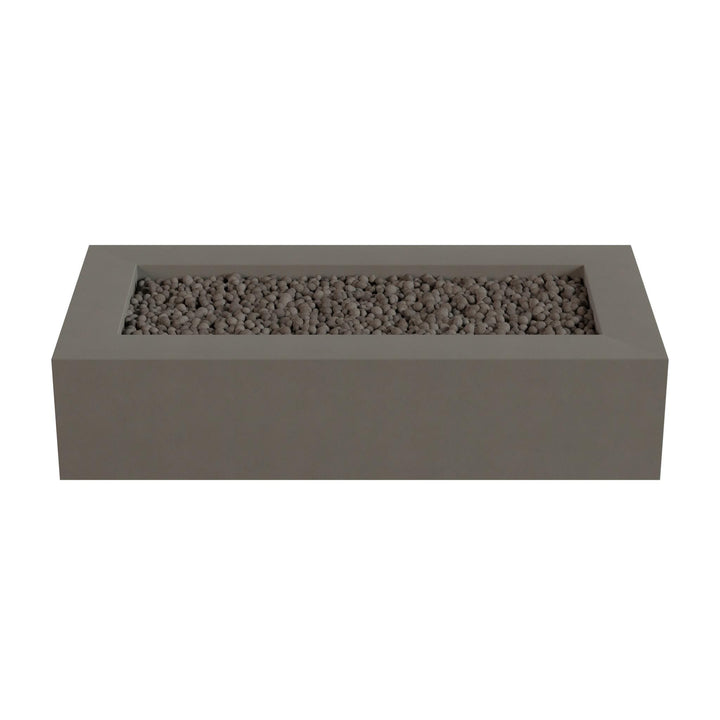 A rectangular concrete planter filled with small rocks or pebbles.
