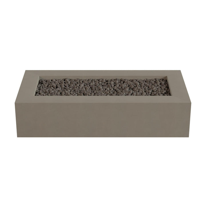 A rectangular concrete planter filled with small rocks or pebbles.