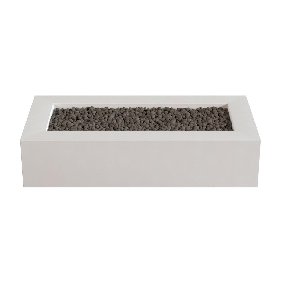 A rectangular white planter box filled with small gray stones or pebbles.