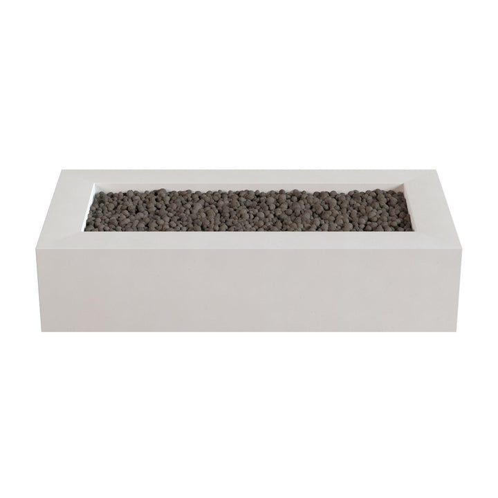A rectangular white planter box filled with small gray stones or pebbles.