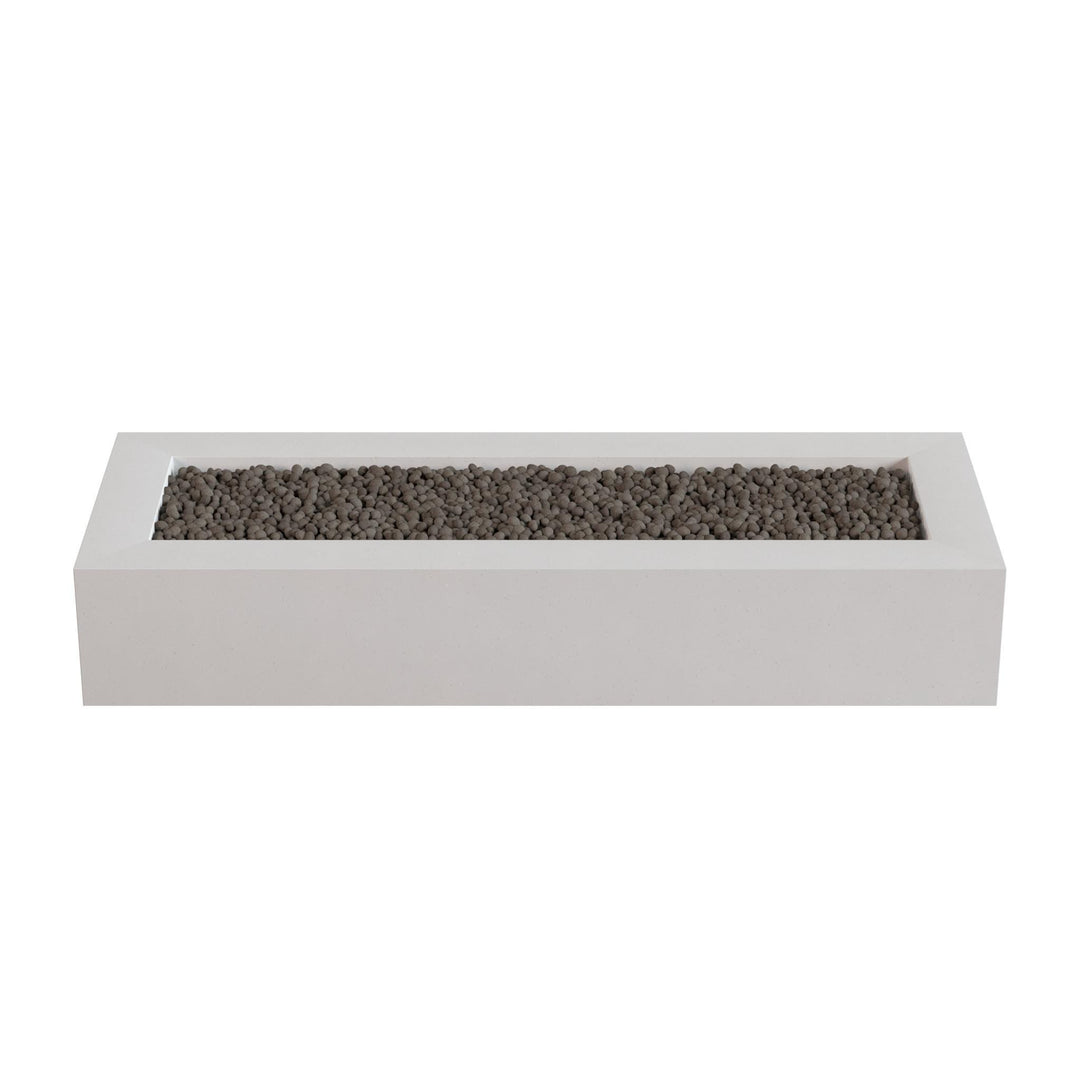 A rectangular white planter box filled with small rocks or pebbles.