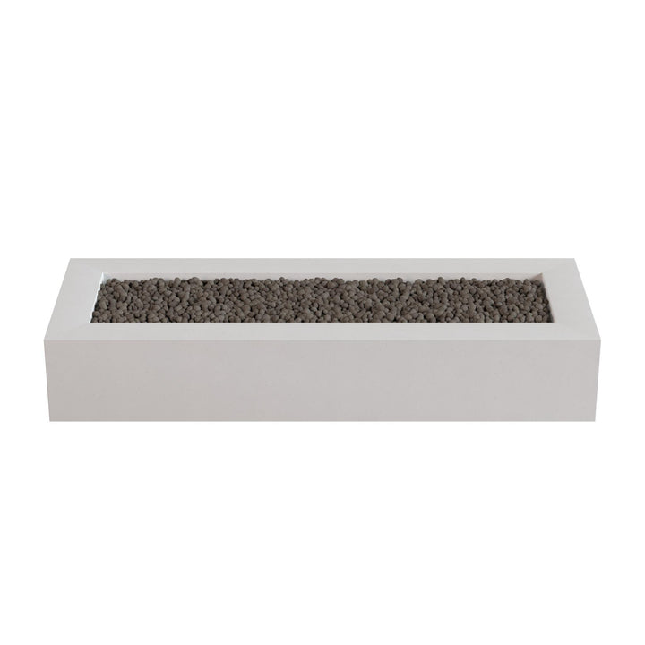 A rectangular white planter box filled with small rocks or pebbles.