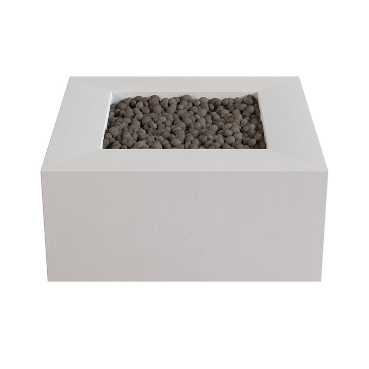 a white rectangular structure with a small opening in the top left corner, filled with small gray stones or pebbles.