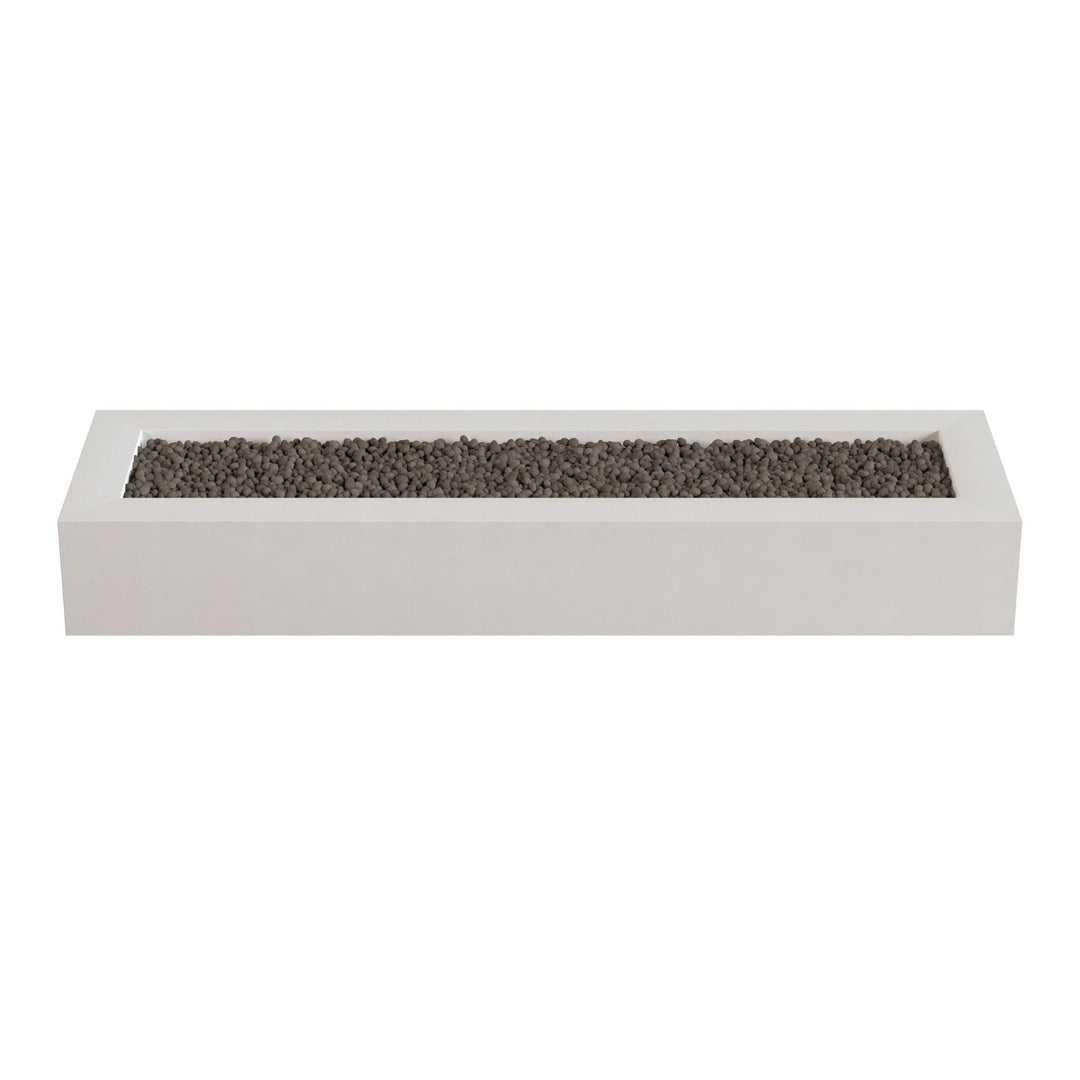 A rectangular white planter filled with small rocks or pebbles.
