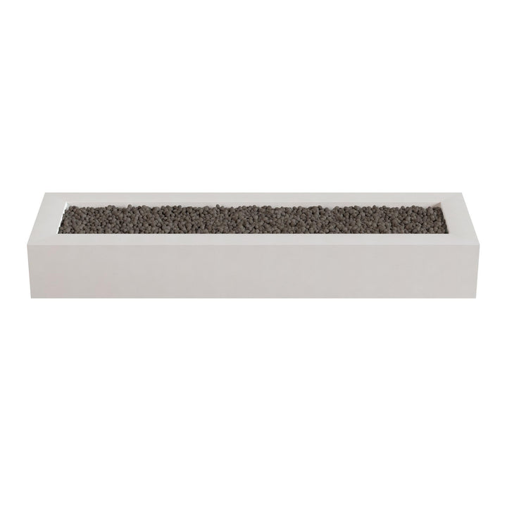 A rectangular white planter filled with small rocks or pebbles.