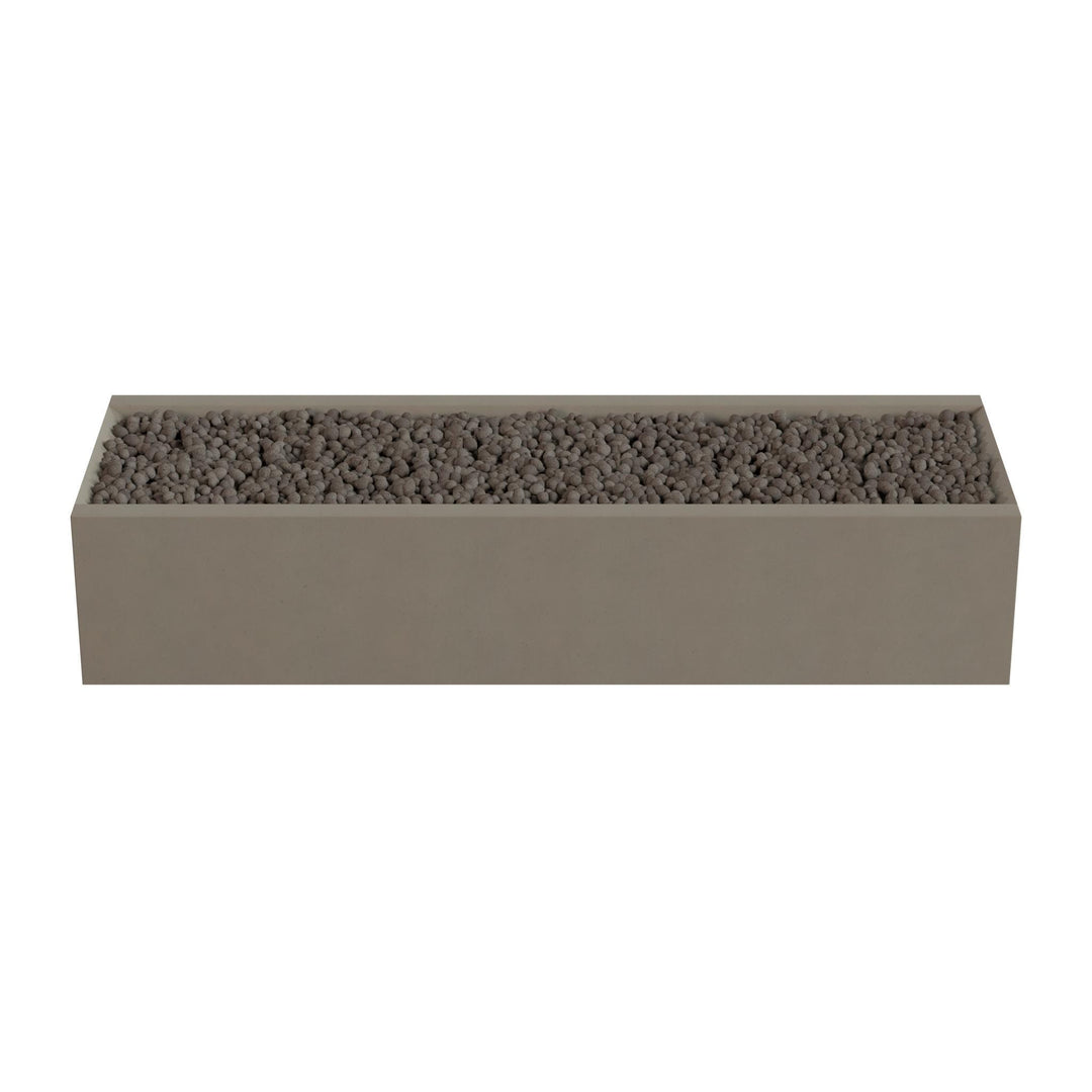A rectangular planter box filled with small rocks or pebbles.