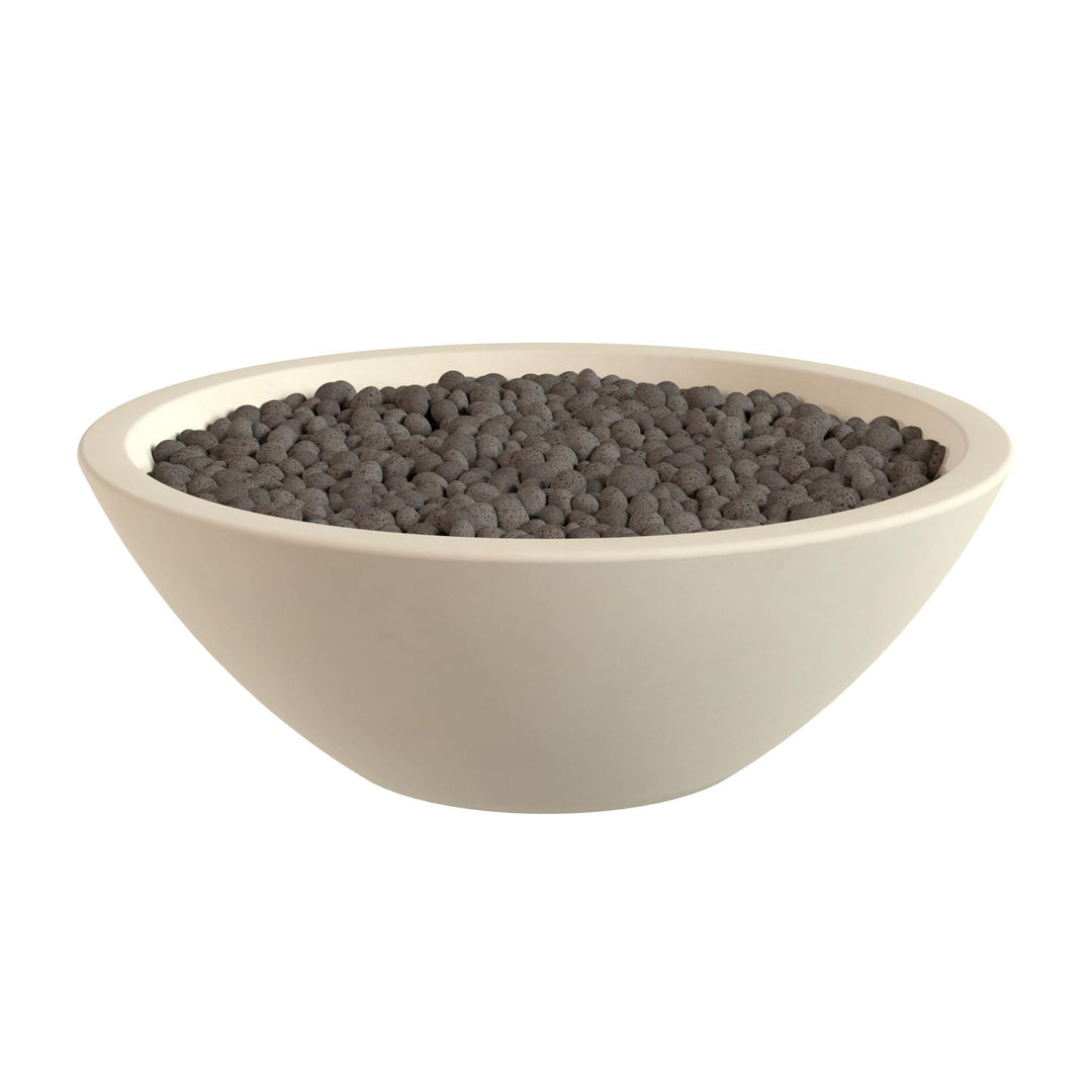 A white bowl filled with dark-colored pebbles or stones.