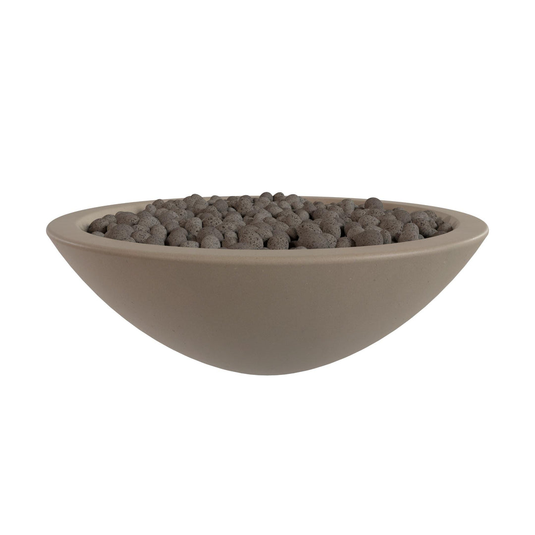 A large, round bowl filled with small, dark-colored stones or pebbles.