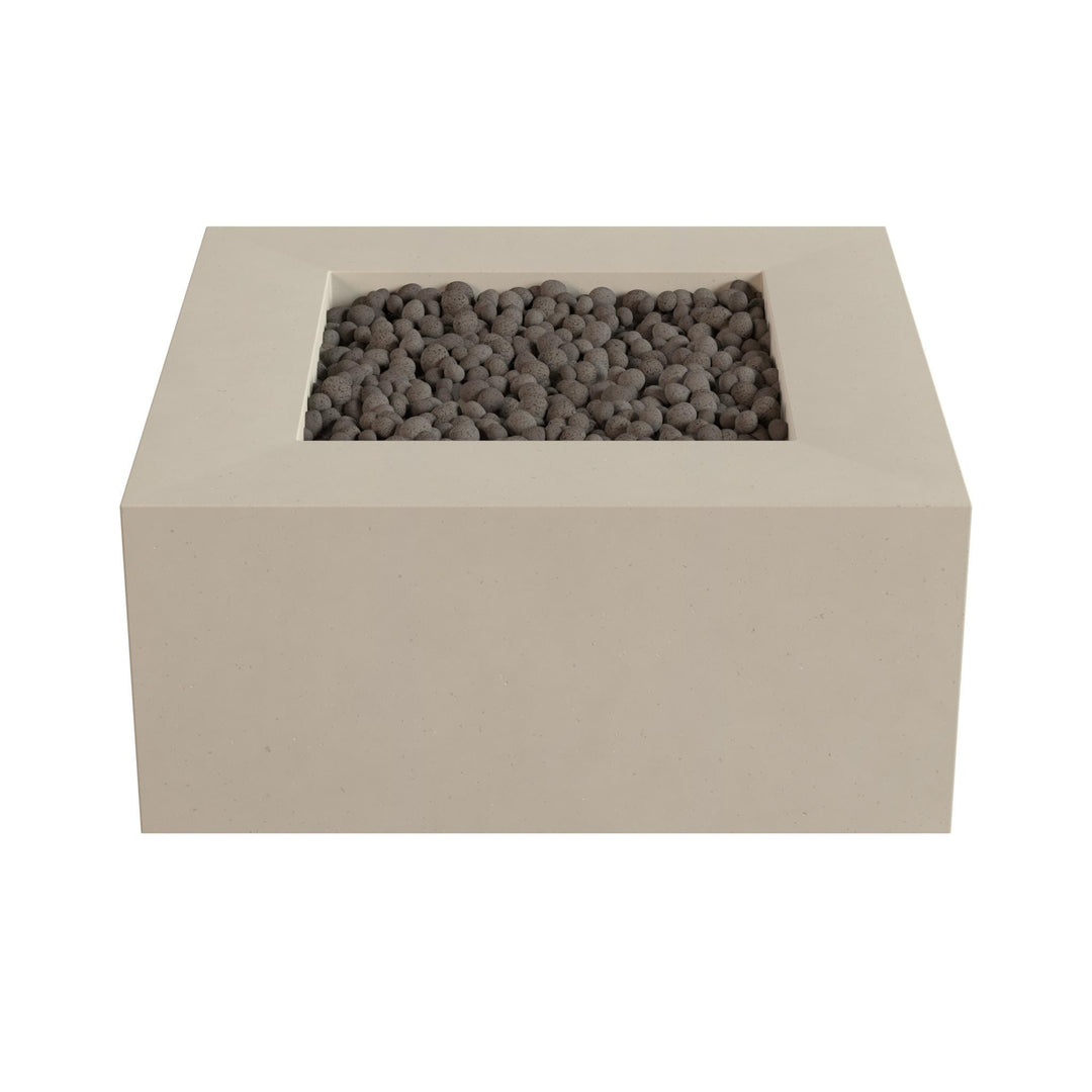 A rectangular concrete planter box filled with small gray stones or pebbles.