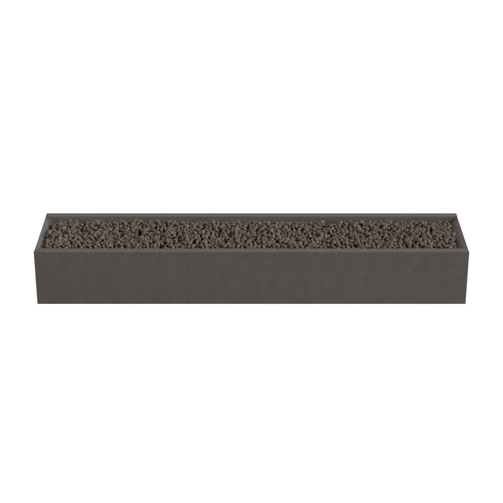 A rectangular planter box filled with small rocks or pebbles.