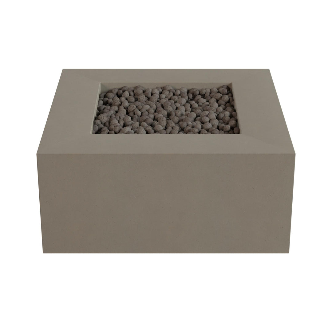 A rectangular concrete planter filled with small rocks or pebbles.