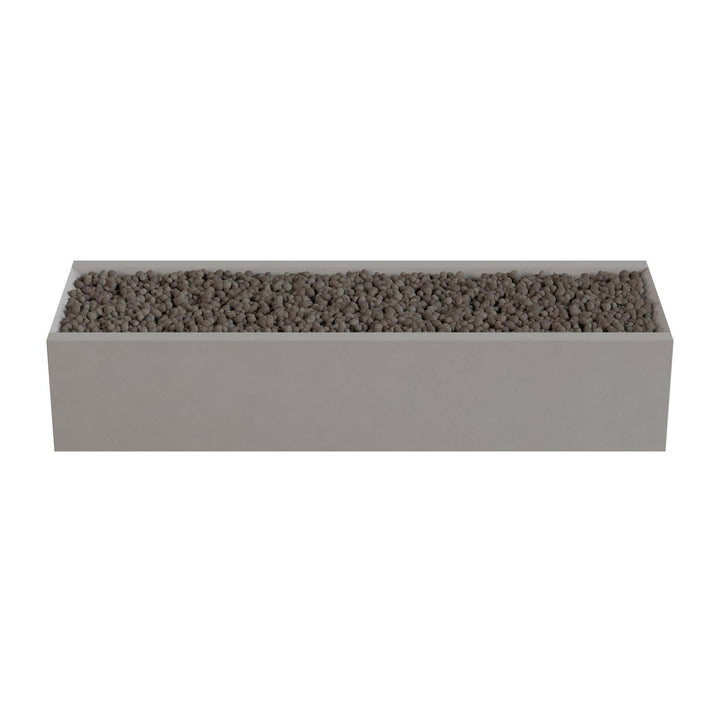 A rectangular planter box filled with small rocks or pebbles.