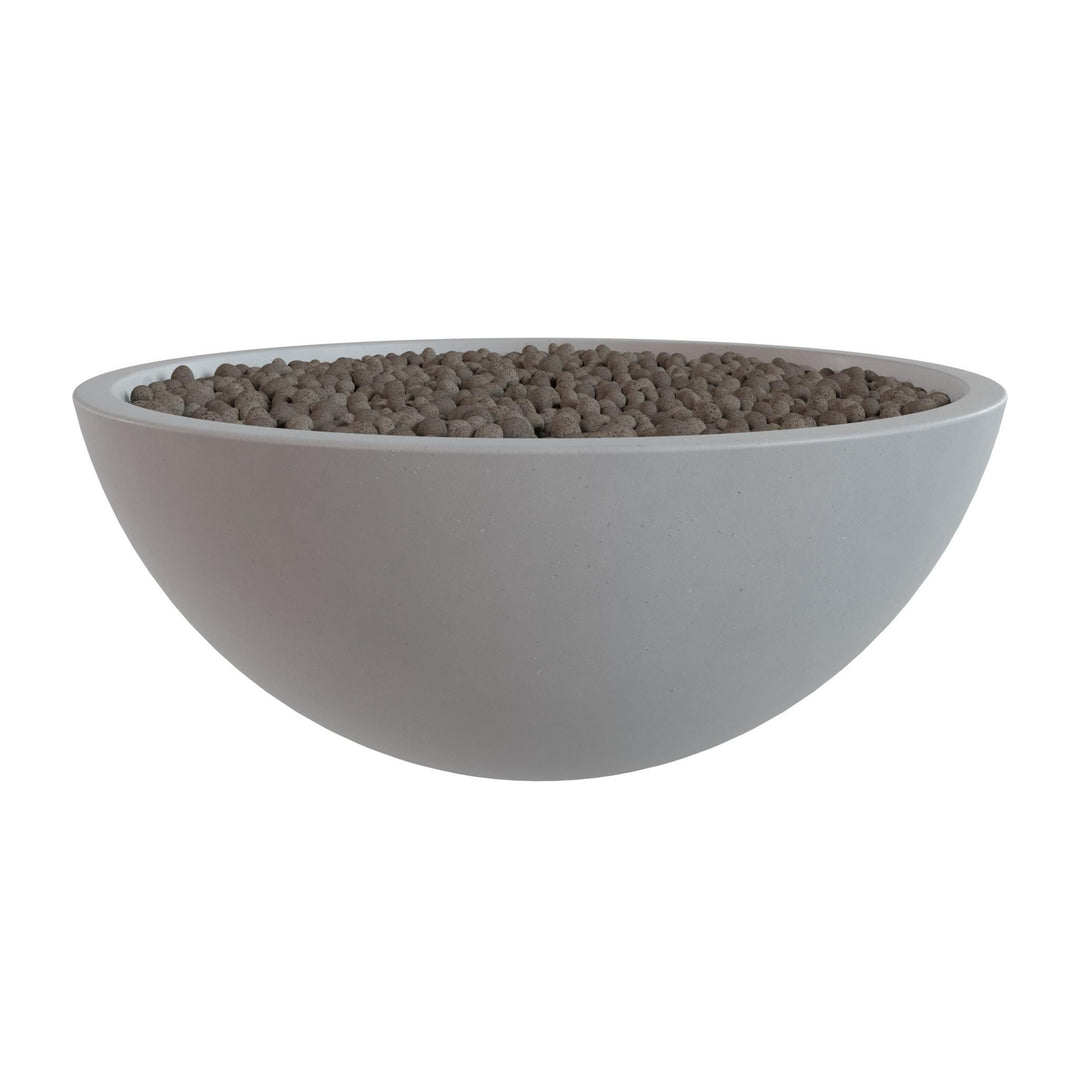 A white bowl filled with small, round objects, likely pebbles or stones, is shown against a white background.