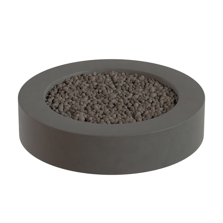a gray, circular planter filled with small, round stones or pebbles.