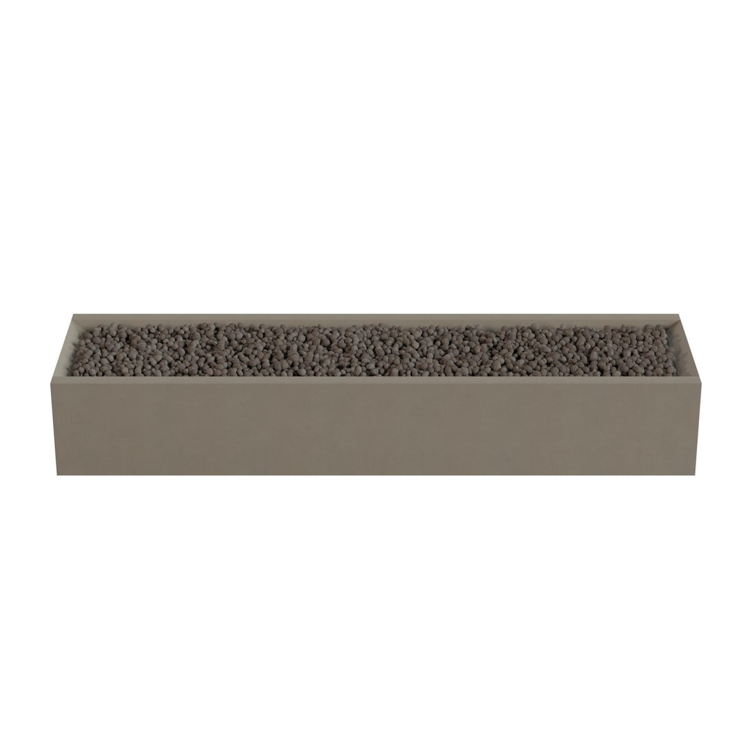 A rectangular planter box filled with small rocks or pebbles.