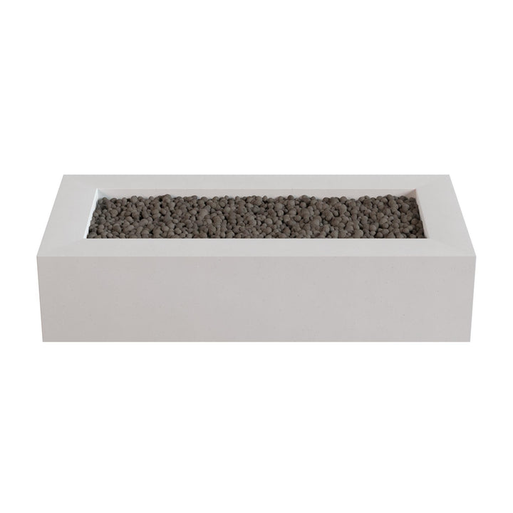 A rectangular white planter box filled with small gray stones or pebbles.