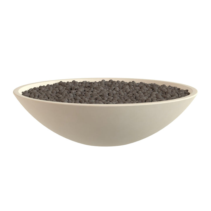 A white bowl filled with dark-colored objects, possibly beads or small stones, is shown against a white background.