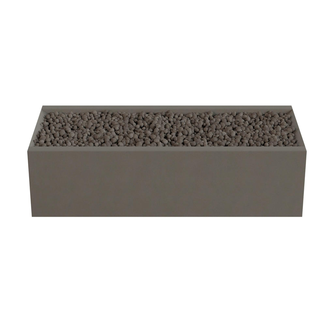 A rectangular planter box filled with small rocks or pebbles.