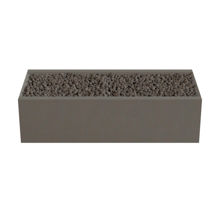 A rectangular planter box filled with small rocks or pebbles.