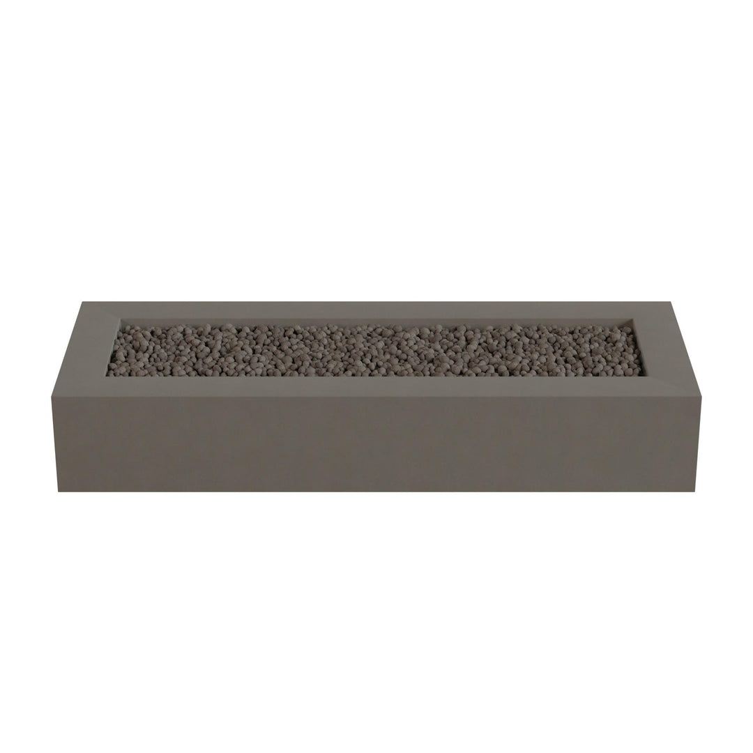 A rectangular gray planter box filled with small rocks or pebbles.