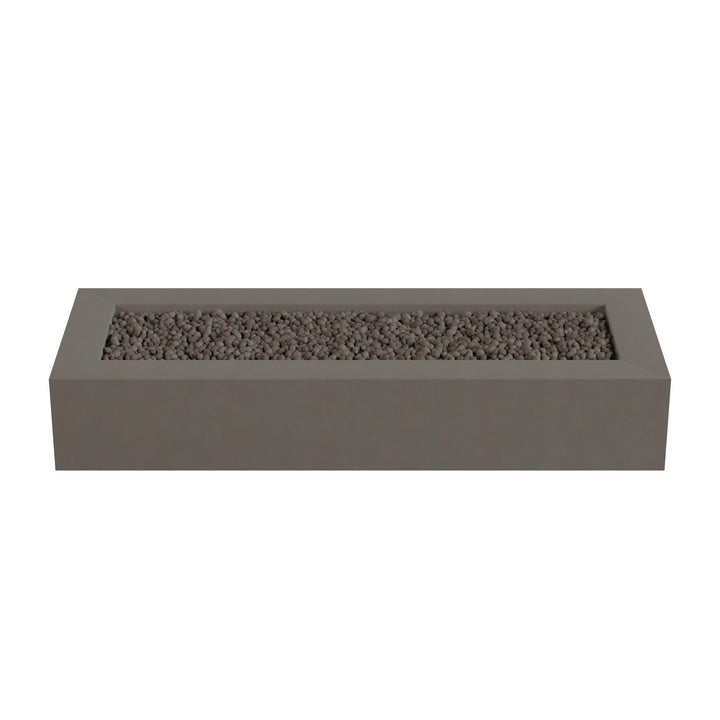 A rectangular gray planter box filled with small rocks or pebbles.