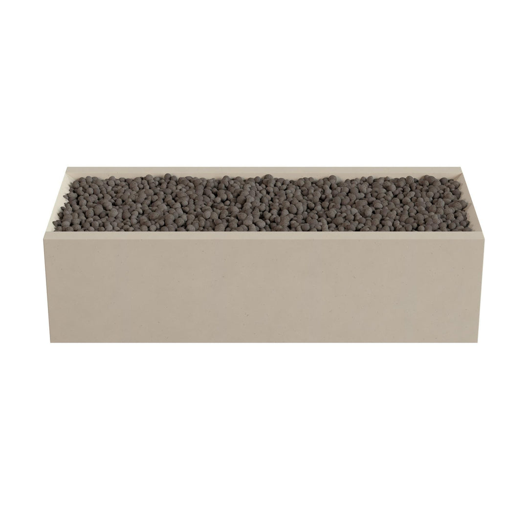A rectangular planter box filled with small rocks or pebbles.