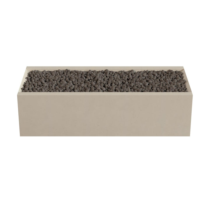 A rectangular planter box filled with small rocks or pebbles.