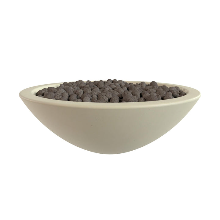 A white bowl filled with small, dark-colored objects, possibly stones or pebbles.