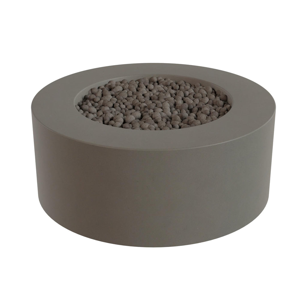 a gray, circular planter filled with small rocks or pebbles.