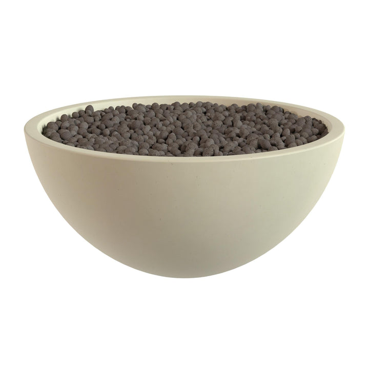 A white bowl filled with small, dark-colored objects, possibly stones or pebbles.