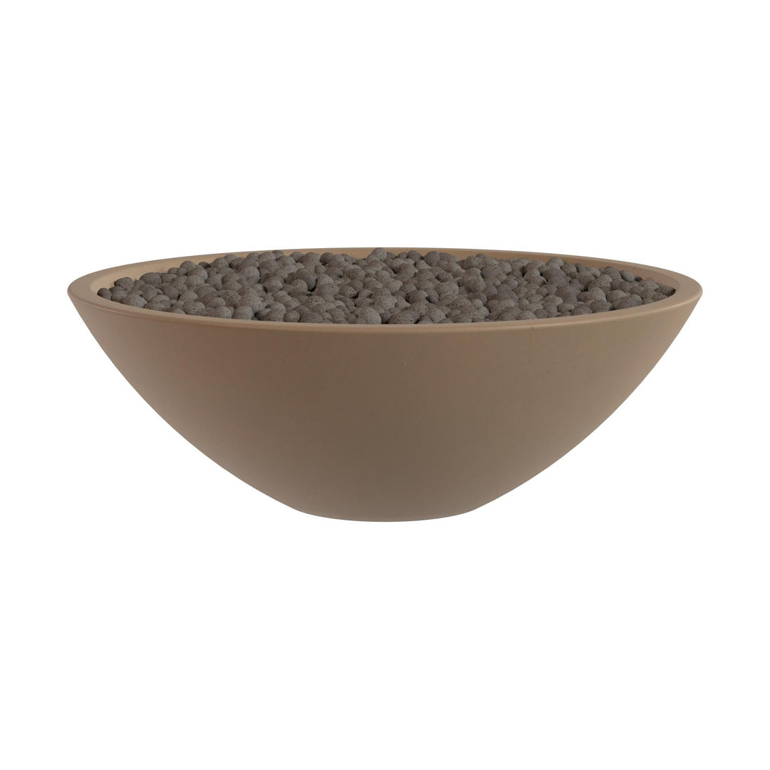 A large, round bowl filled with small, dark-colored stones or pebbles.