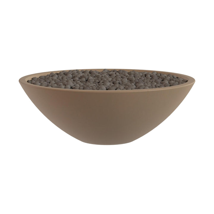A large, round bowl filled with small, dark-colored stones or pebbles.