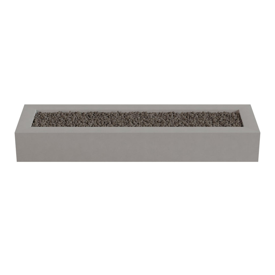 A rectangular concrete planter filled with small rocks or pebbles.
