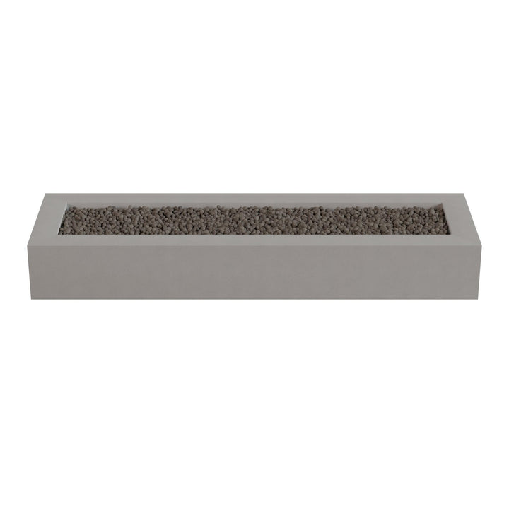 A rectangular concrete planter filled with small rocks or pebbles.