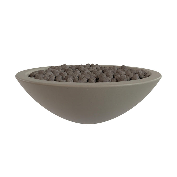 A gray bowl filled with small, round objects, possibly beads or stones, is shown against a white background.