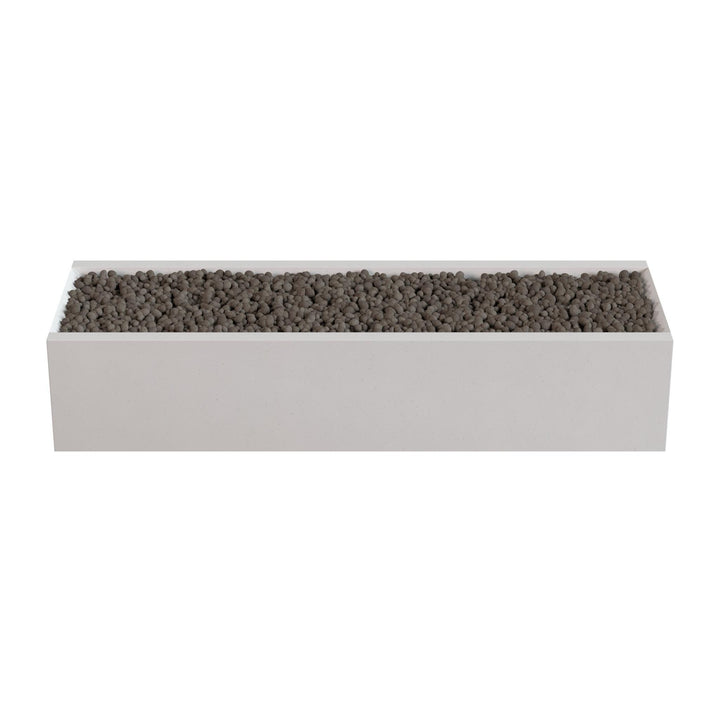 A rectangular white planter box filled with small dark rocks or pebbles.
