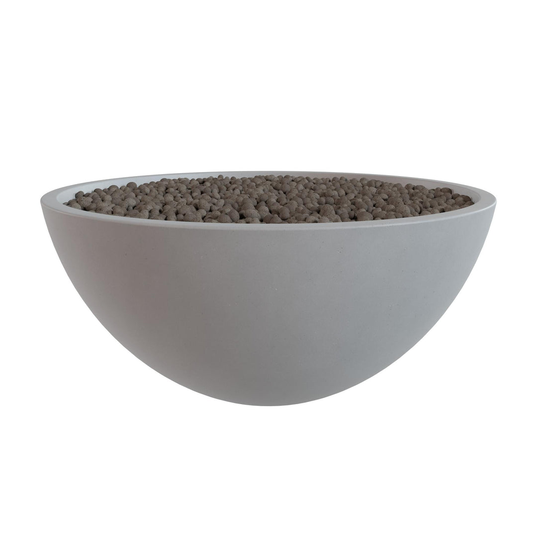 A white bowl filled with small, round objects, possibly beads or stones, is shown against a white background.