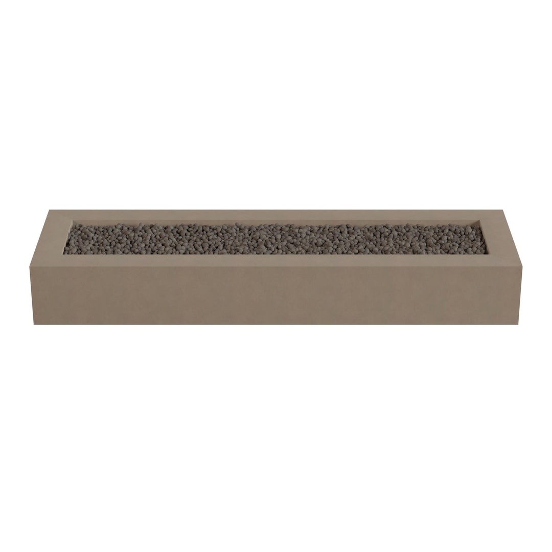 A rectangular concrete planter box filled with small rocks or pebbles.