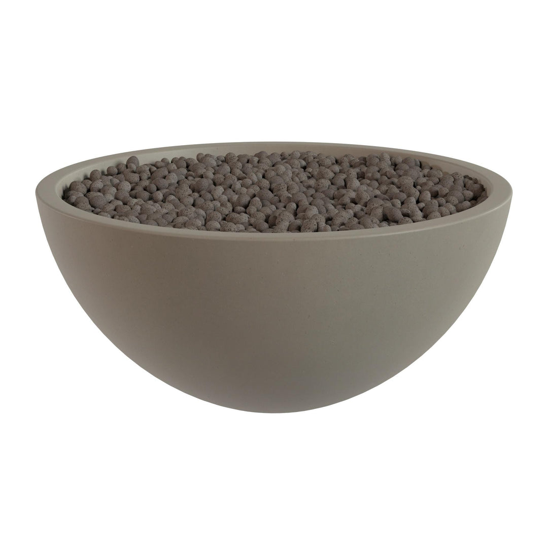 A large, round bowl filled with small, dark-colored stones or pebbles.