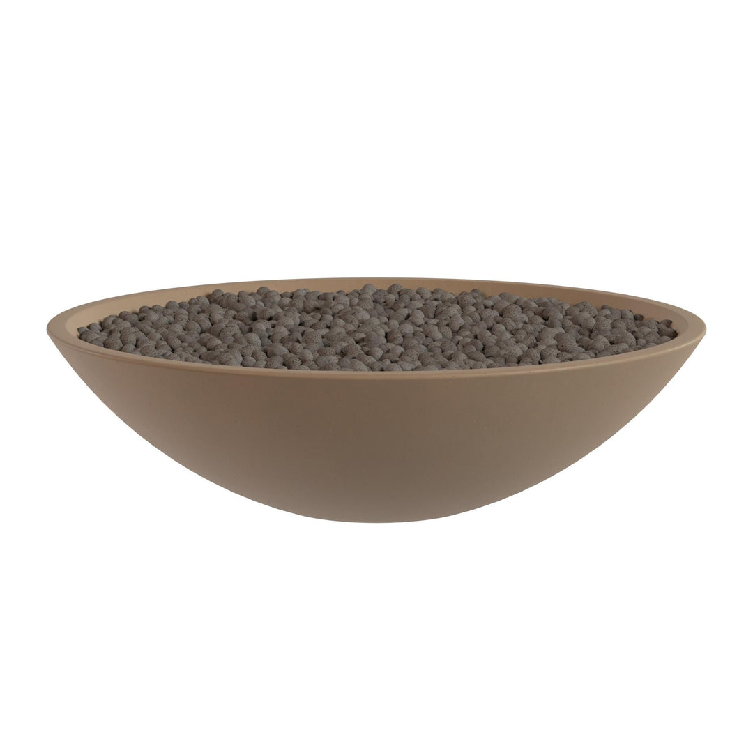 A large, round bowl filled with small, dark-colored stones or pebbles.