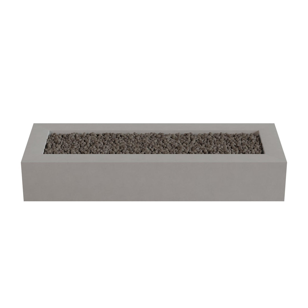 A rectangular concrete planter filled with small rocks or pebbles.