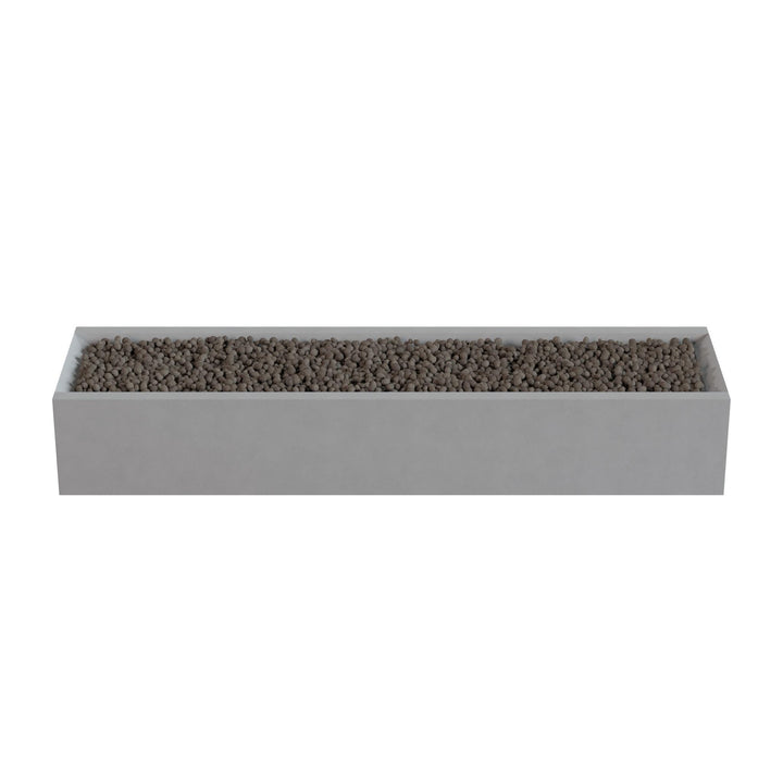 A rectangular planter box filled with small rocks or pebbles.